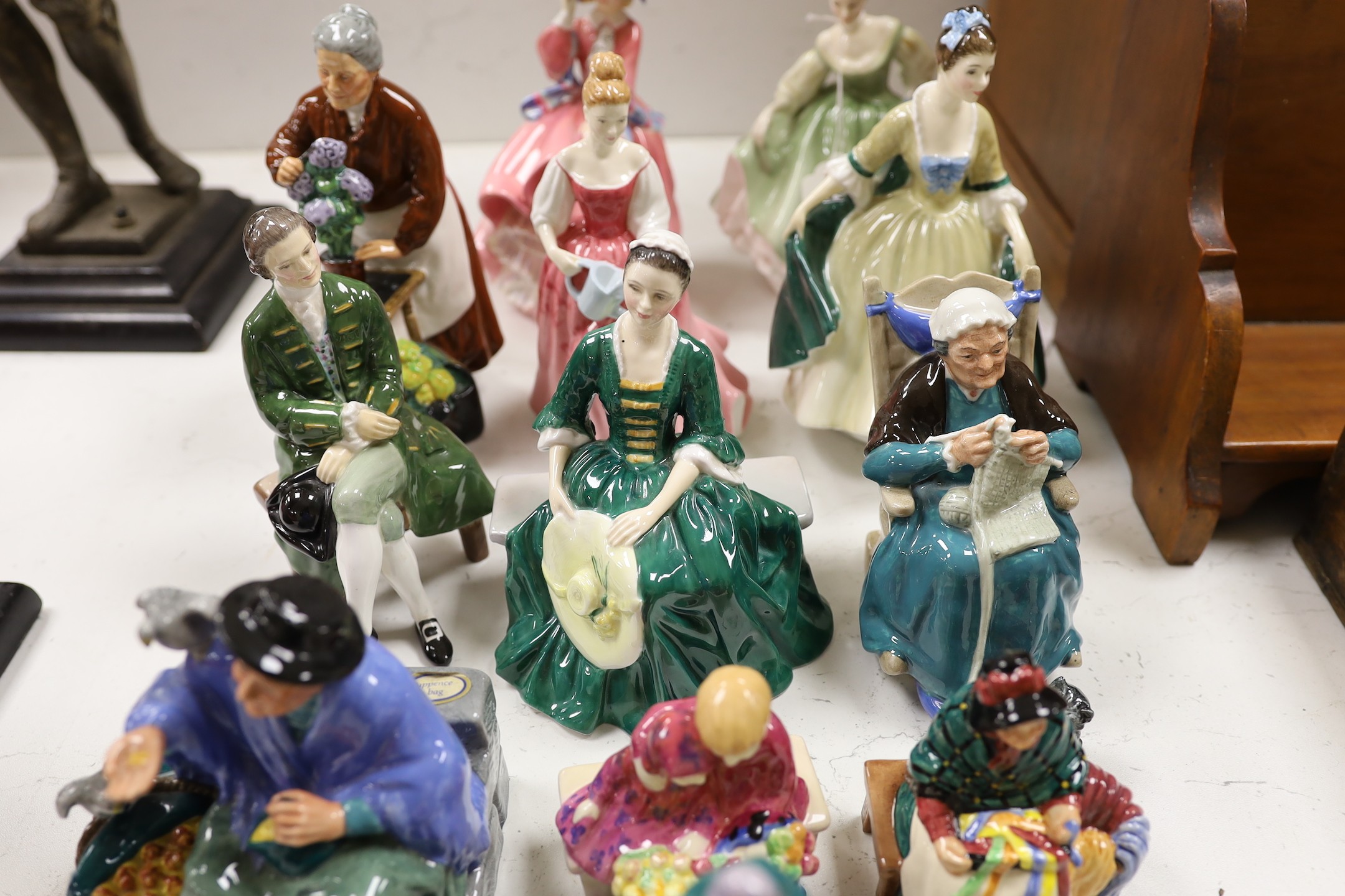 Fifteen Royal Doulton figures of varying heights, tallest Top O the hill 19cms high